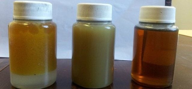 showing dirty hydraulic oil as it is progressively cleaned showing free water, emulsified oil and clean/bright oil.