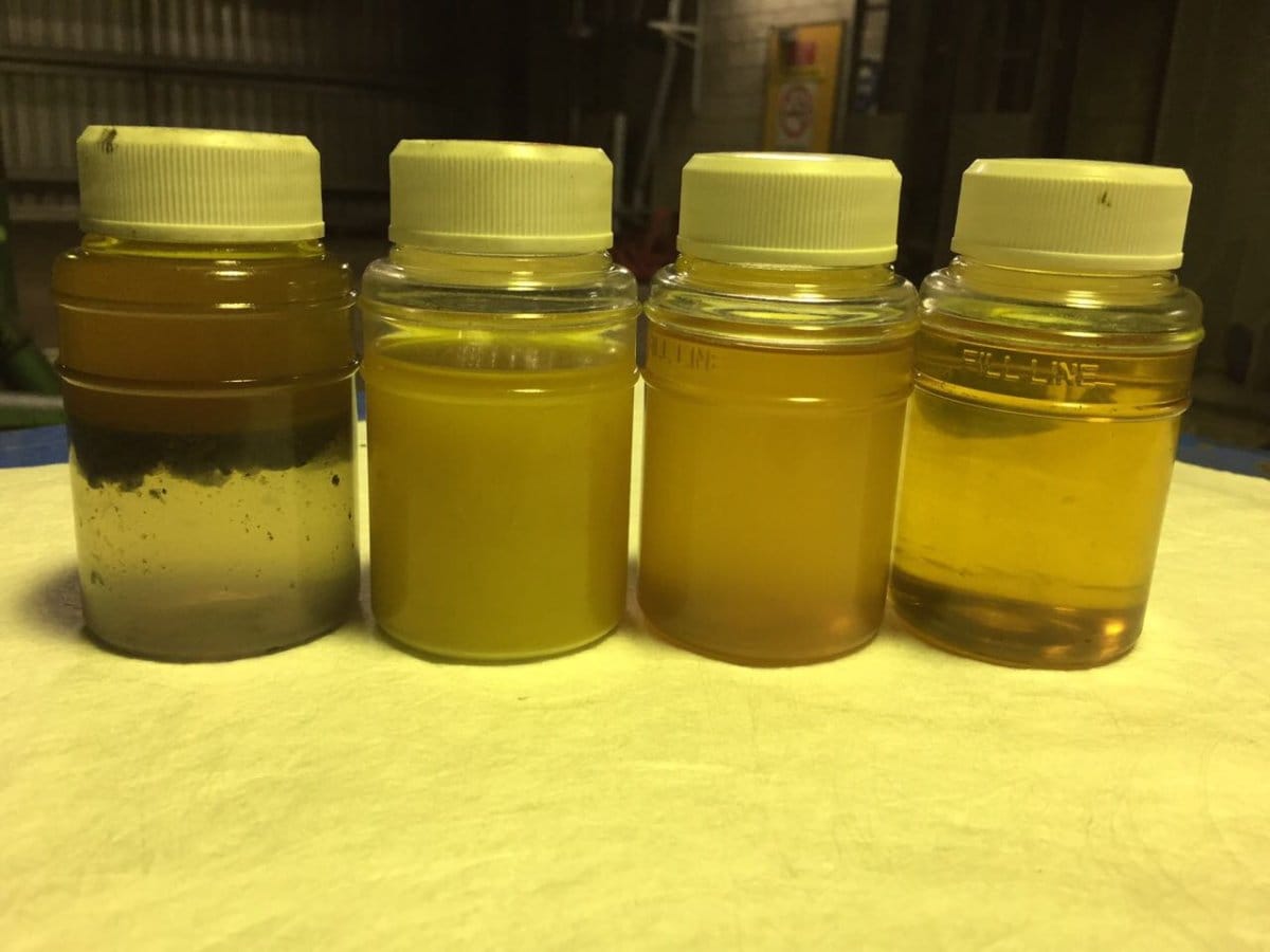 Contaminated oil with a microbial 'bug' growth and progression to clean oil