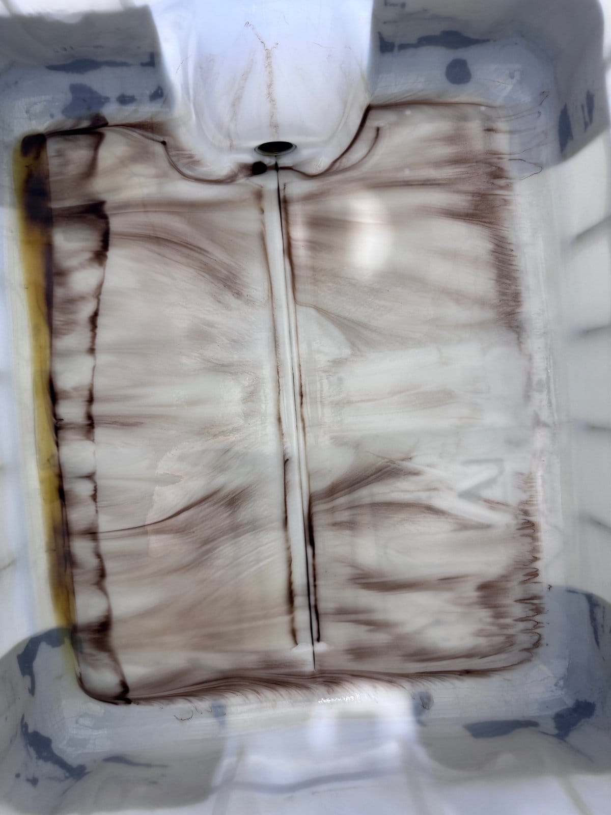 IBC with new oil contaminated with particulate 1